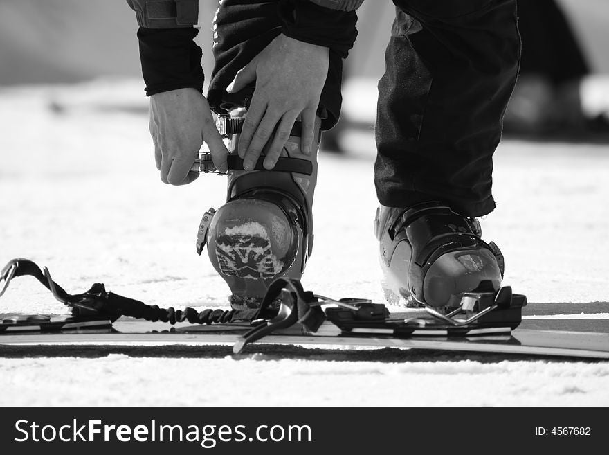 Preparation for snowboarding in the Alpes.