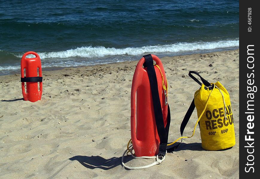 Patrol rescue cans and bag of rip tide rescue rope prepared for assisting swimmers... Ocean Grove beach, New Jersey, U.S.A. Patrol rescue cans and bag of rip tide rescue rope prepared for assisting swimmers... Ocean Grove beach, New Jersey, U.S.A.