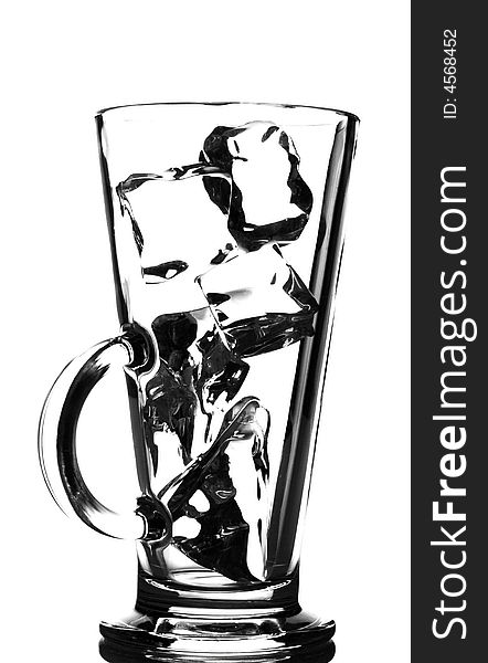 Ice cubes in a tall glass, back light, isolated on white