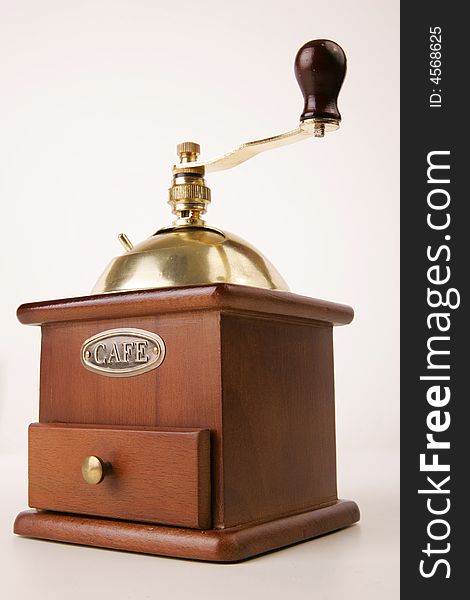 A grinding device to mill coffee beans. A grinding device to mill coffee beans