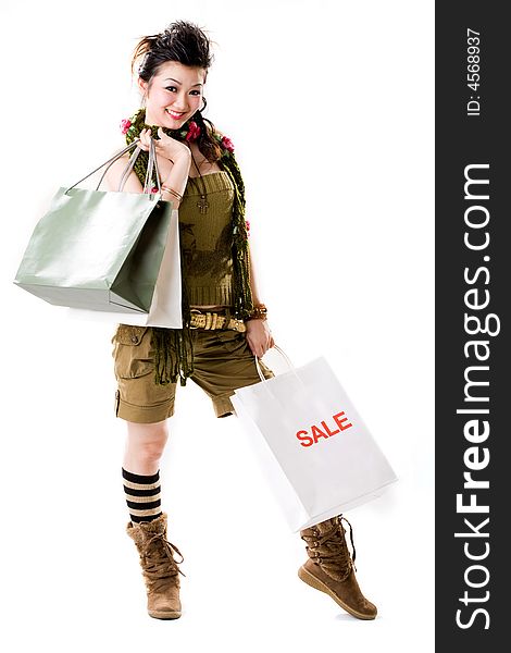 Woman with hand full of paper bags after shopping. Woman with hand full of paper bags after shopping