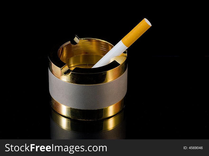 Ashtray and cigarette