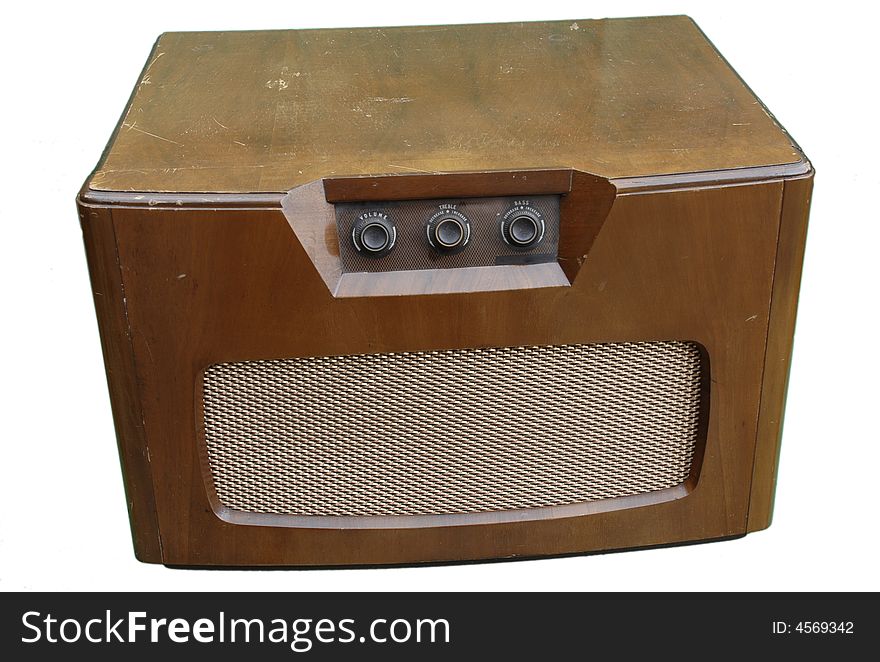 Vintage style 1960s record player in a wooden cabinet showing the volume controls. Vintage style 1960s record player in a wooden cabinet showing the volume controls.