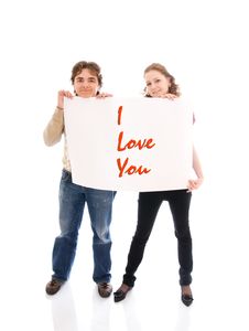 The Happy Couple With A Poster Isolated On A White Stock Photography The Happy Couple With A Poster Isolated On A White Stock Photography