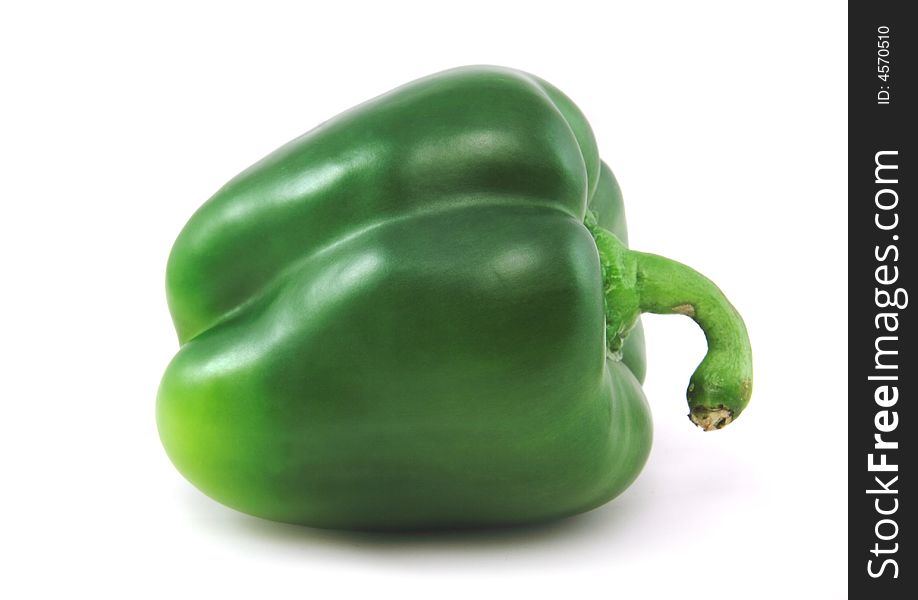 A green pepper isilated against a white background