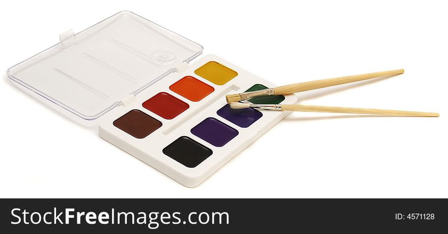 Brushes and paint isolated on white