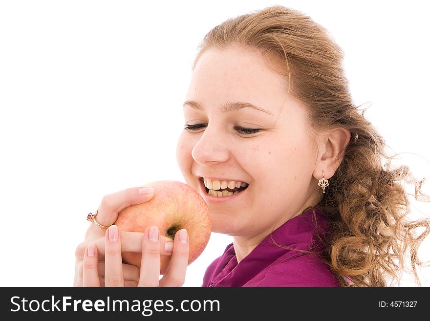 The young beautiful girl with the apple isolated on a white background