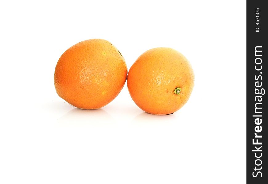 Two oranges isolated on a white background