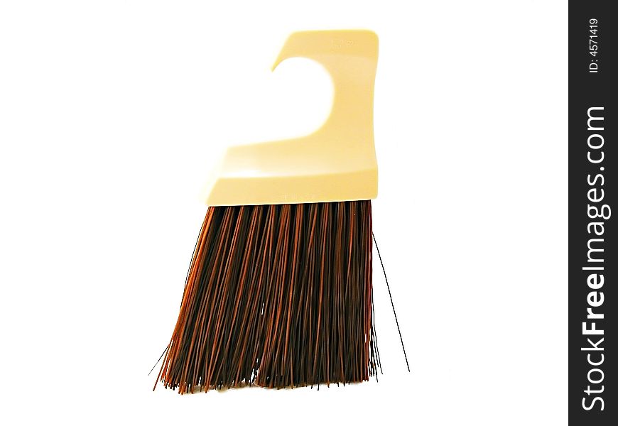 A clothing brush isolated on a white background.