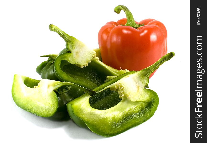 Red and green peppers isolated on white