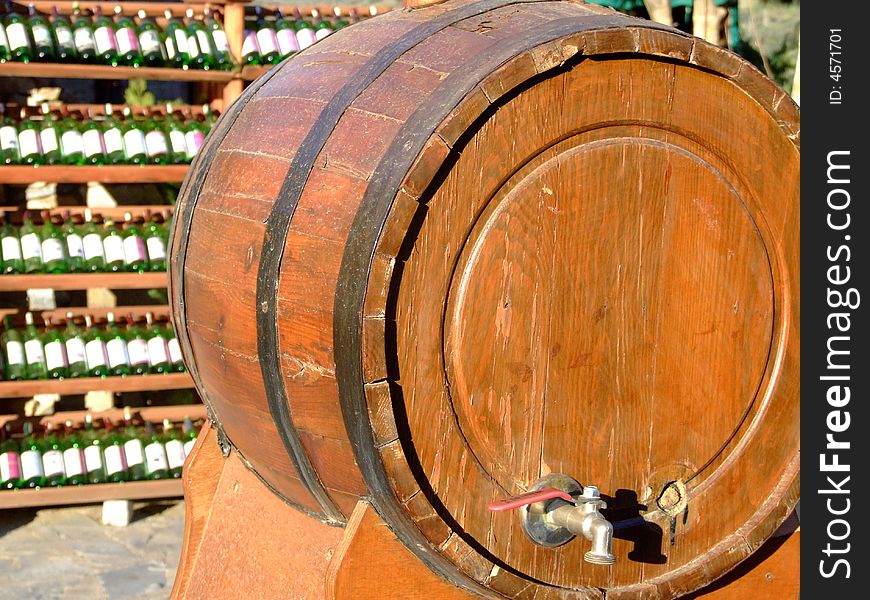 Wine cask with interesting pump for to make wine and flagons