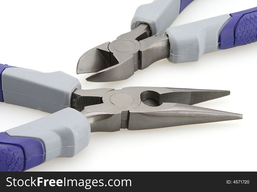 Blue gray handle cutters and needle nose pliers. Blue gray handle cutters and needle nose pliers