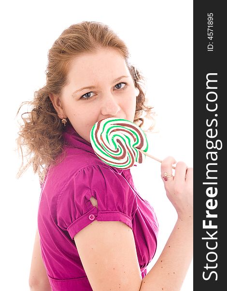 The girl with a sugar candy isolated on a white