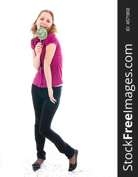 The girl with a sugar candy isolated on a white background