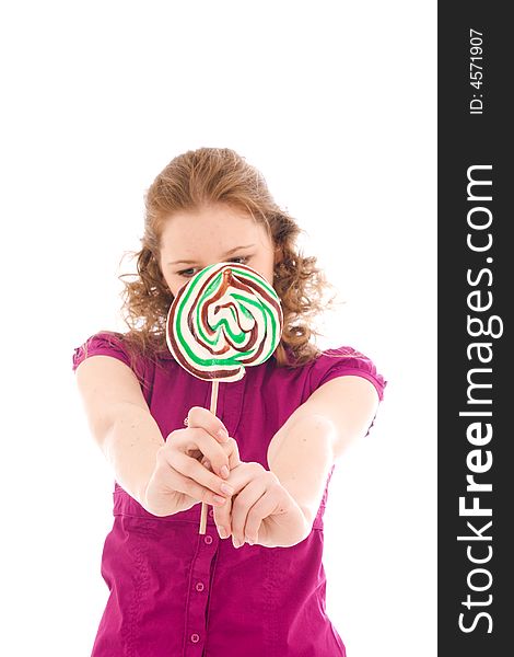 The girl with a sugar candy isolated on a white background