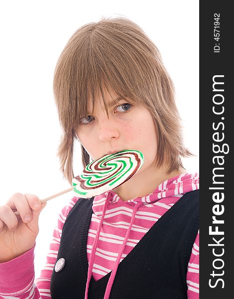 The girl with a sugar candy isolated on a white background