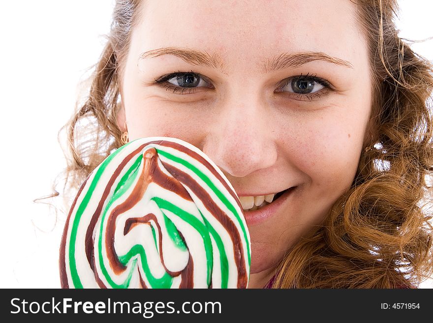 The Girl With A Sugar Candy Isolated On A White