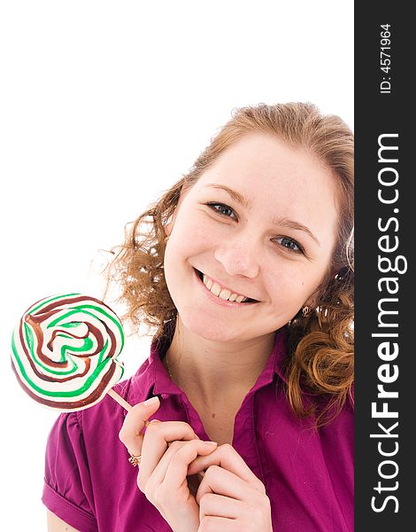 The girl with a sugar candy isolated on a white background