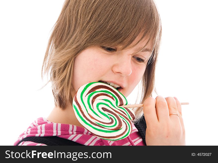 The girl with a sugar candy isolated on a white background