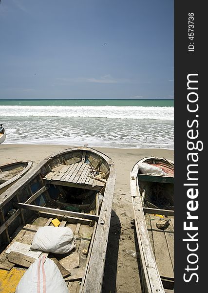 Old wooden fishing boats along the ruta del sol pacific ocean ecuador. Old wooden fishing boats along the ruta del sol pacific ocean ecuador