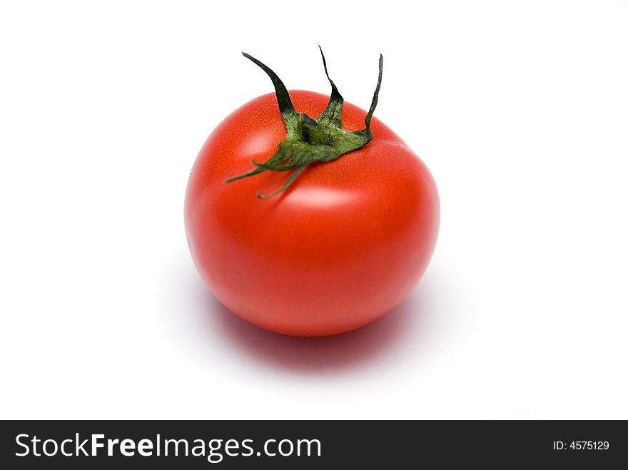 Juicy Isolated Tomato on the white background