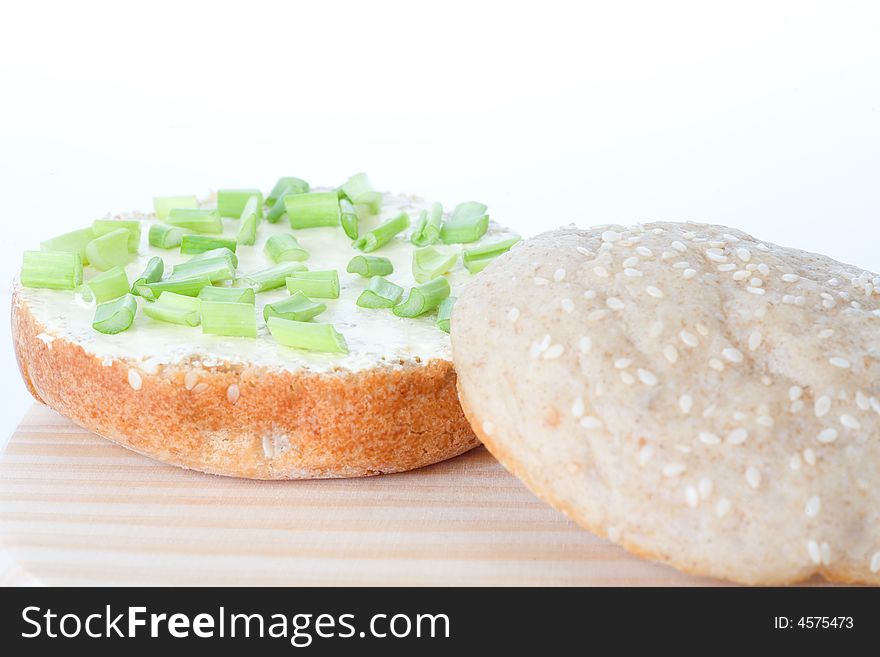 Baked roll with onion, isolated