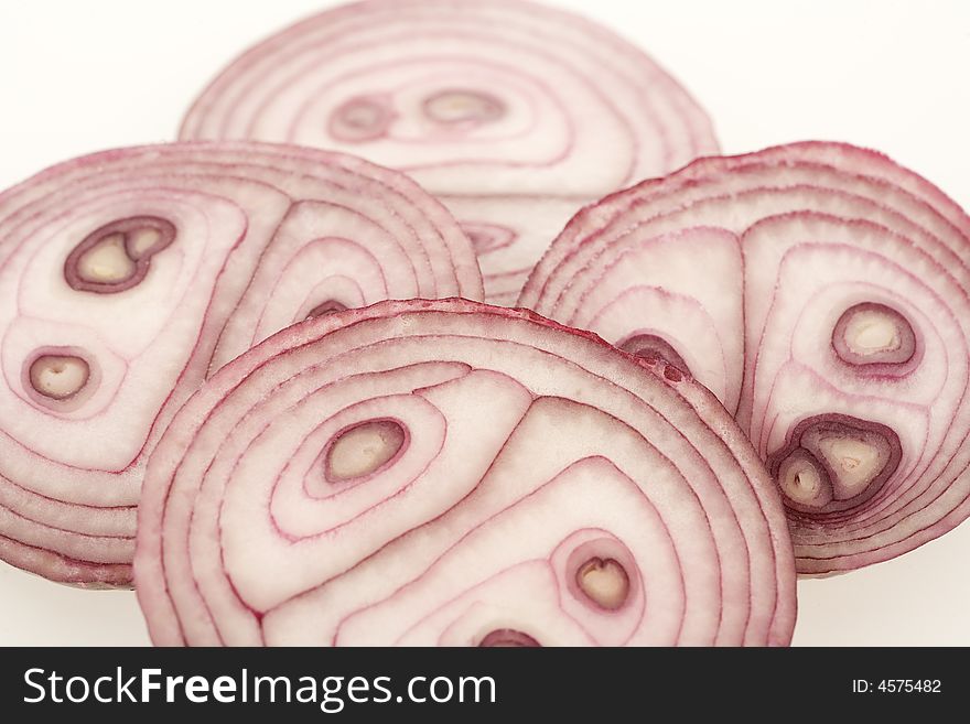 Sliced red onion, isolated on white