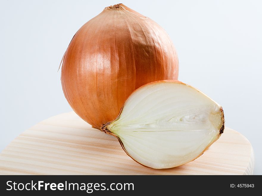 Two onions on white background