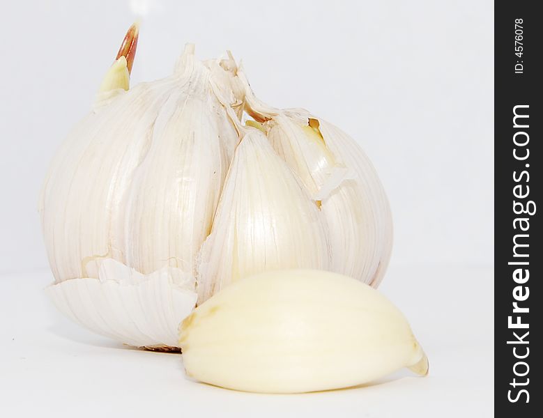 Detailed foto of garlic on white background