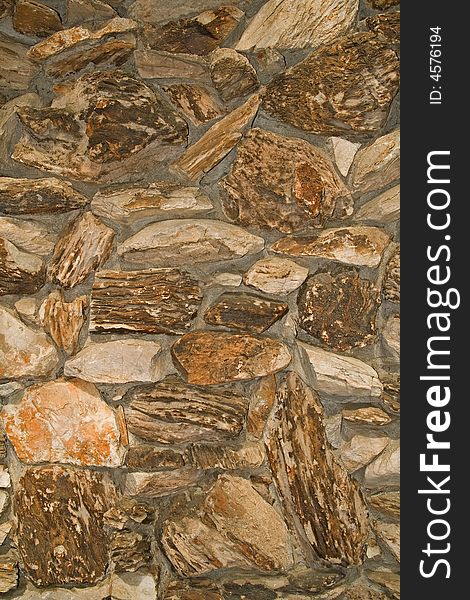 Brown stone wall texture, background