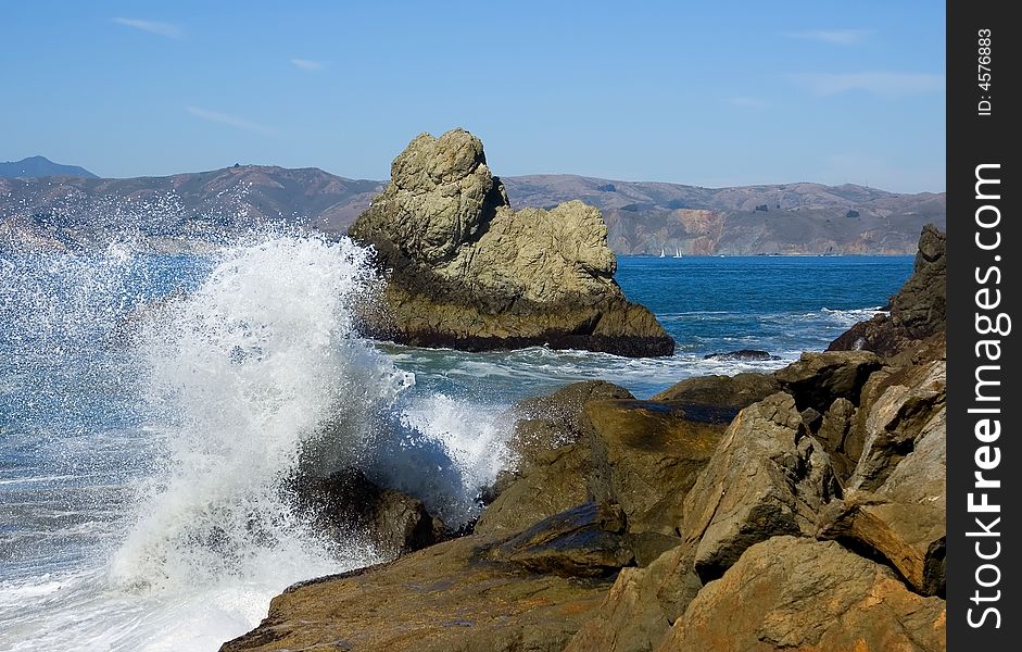 Waves crashing against the rocks