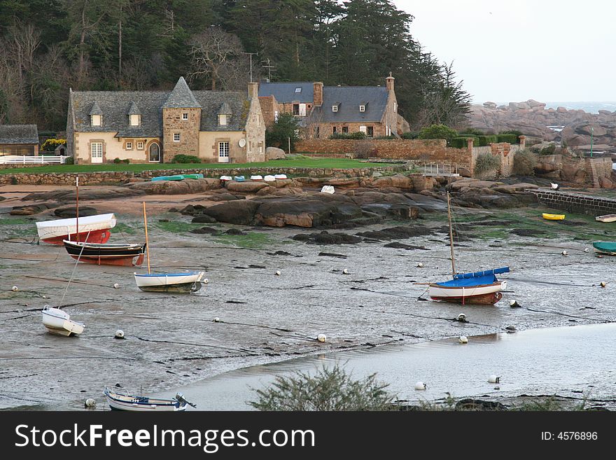 Granite house on french coast low tide