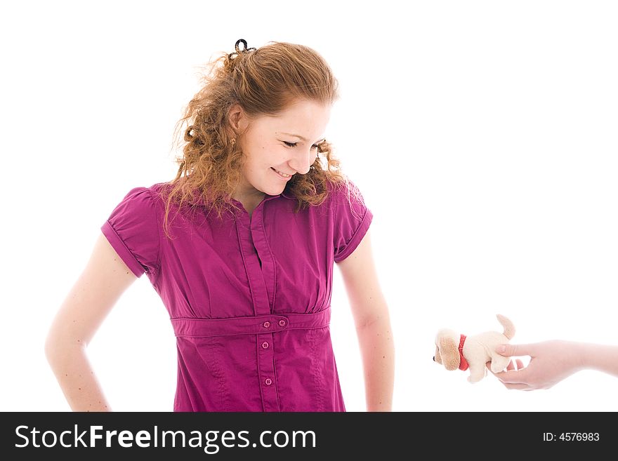 The young beautiful girl with a toy isolated on a white background