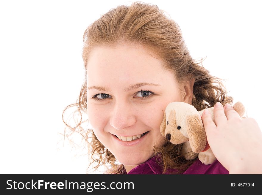 The Young beautiful girl with a toy isolated on a white background