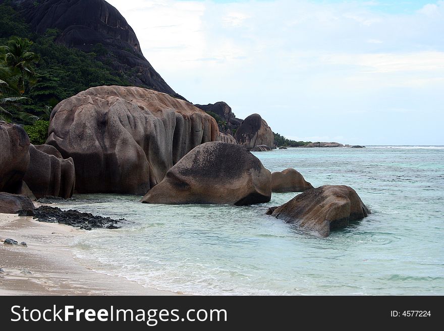 Several volcanic tropical stones in the ocean