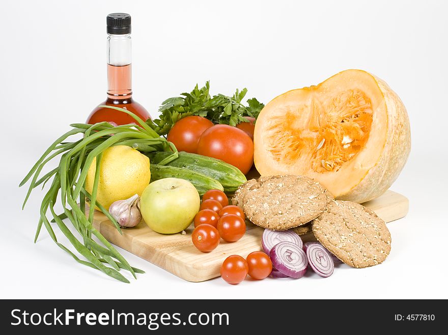 Still-life with vegetables isolated on a white background. Still-life with vegetables isolated on a white background.