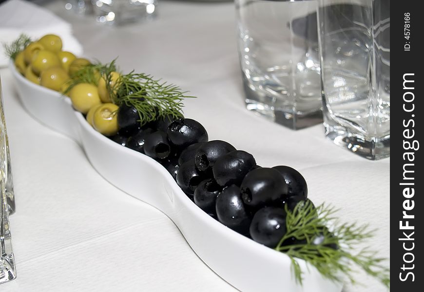 A collection of green and black olives like part of the mediterranea diet