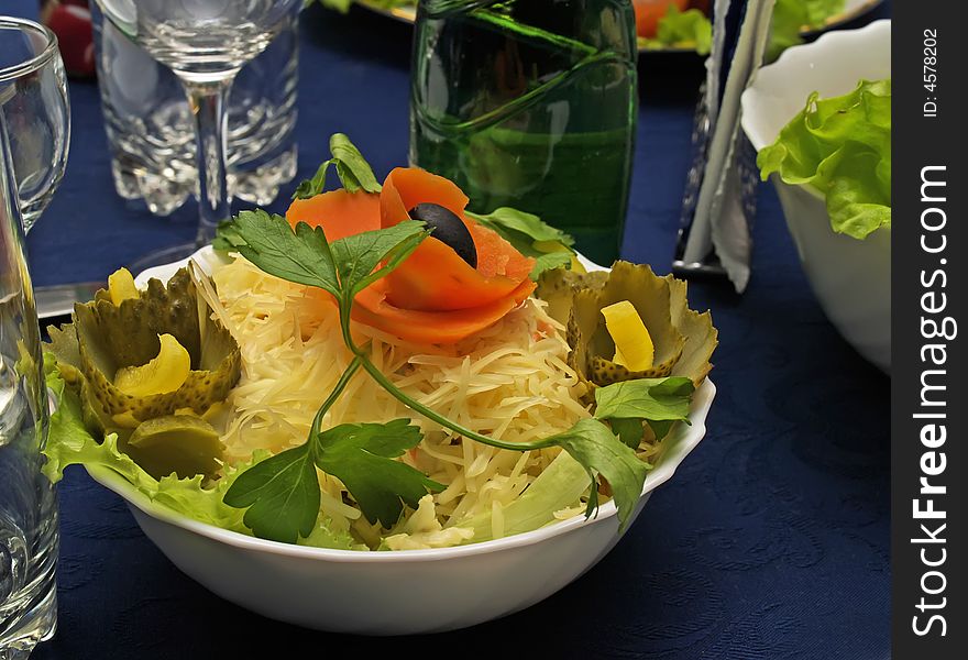 Beautifully served cheese salad on served table