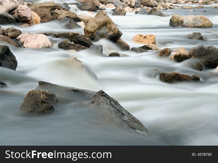 River rocks with blurred motion