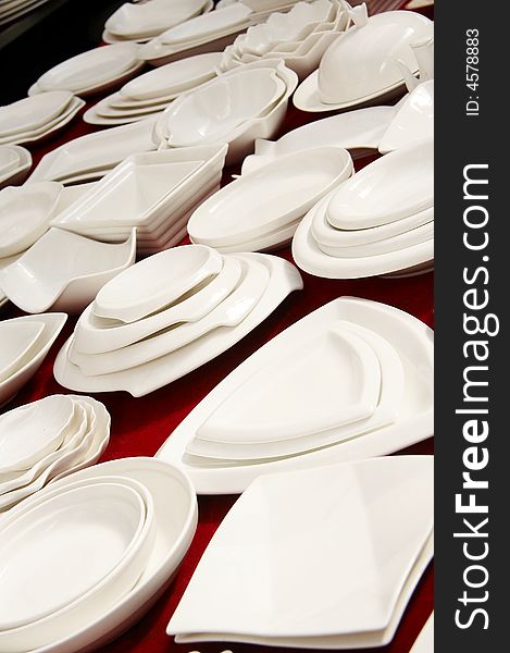 A stack of dishware displaying on sale. A stack of dishware displaying on sale