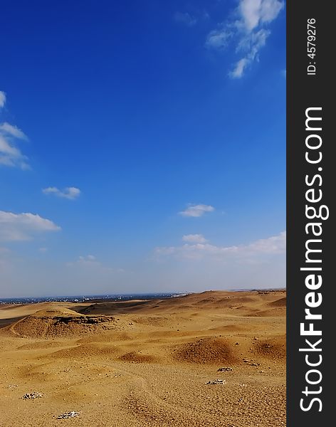 Orange sand on the desert and the blue sky in egypt