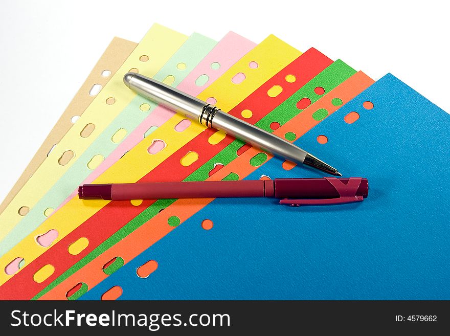 Divider set and pens on white background