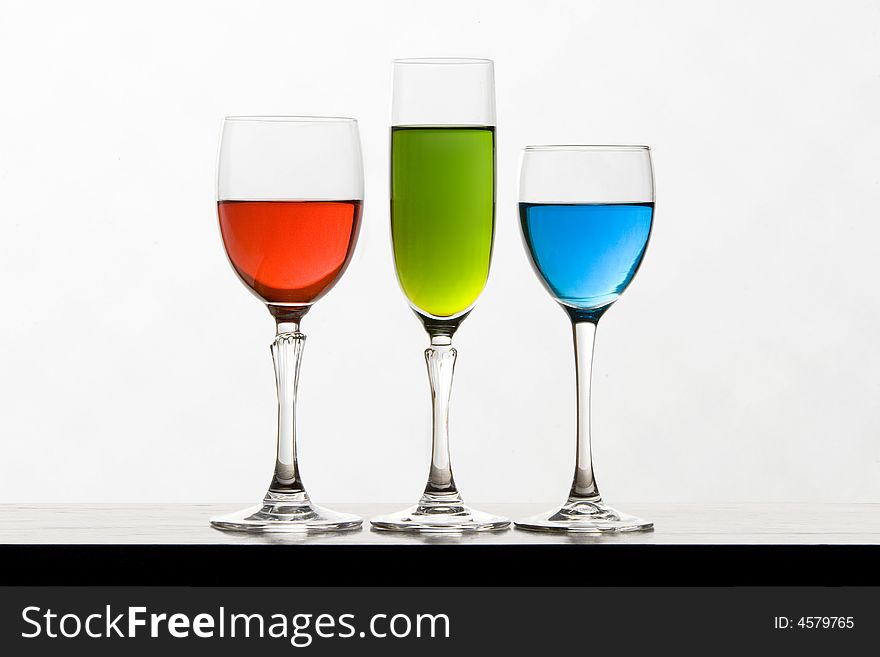 RGB glasses of wine isolated on white background