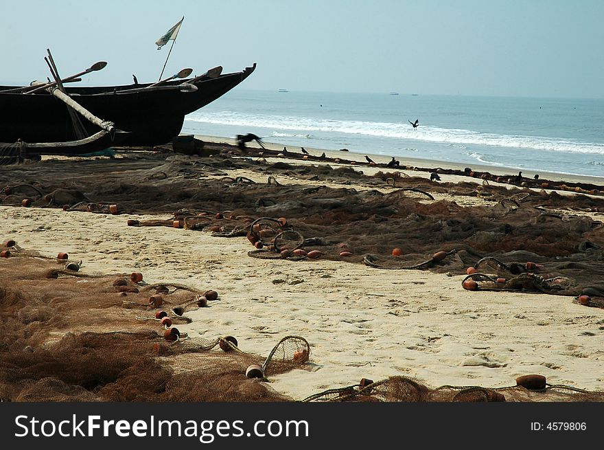 South Goa, boat, birds and net. South Goa, boat, birds and net