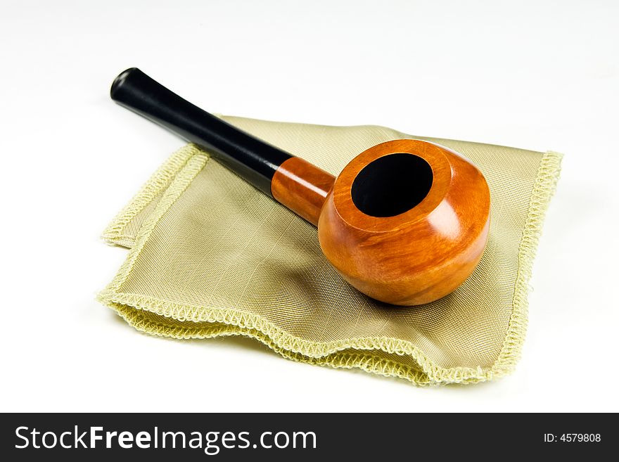Expensive pipe with black mouthpiece on white background