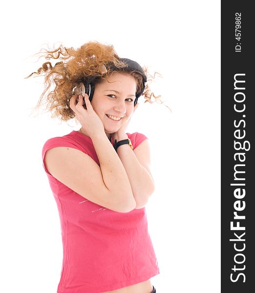 The young girl with a headphones isolated on a white background