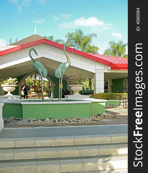 Fountain of cranes at sands grande resort in st. lucia  west indies and eastern caribbean at rodney bay. Fountain of cranes at sands grande resort in st. lucia  west indies and eastern caribbean at rodney bay