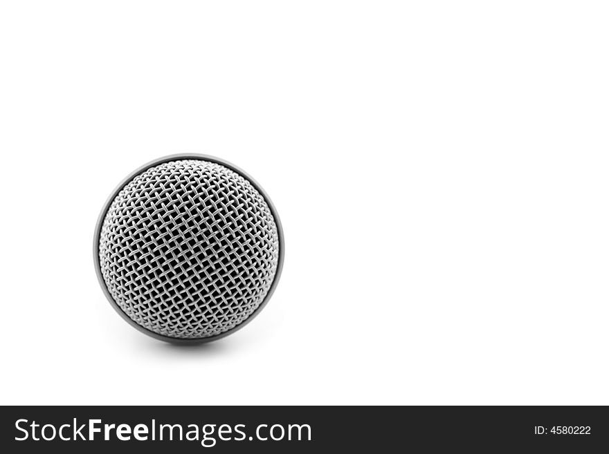 Close-up microphone - isolated on white, shallow DOF. Close-up microphone - isolated on white, shallow DOF