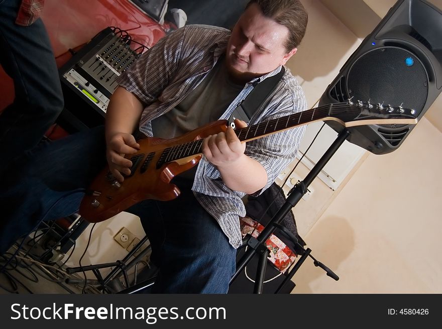 The musician with a guitar. Concert of group StockDog in club the Woman-ljuba. Rostov-on-Don. Russia