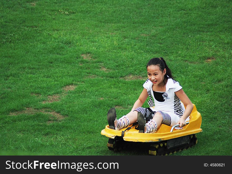 An girl doing Slippery grass movement